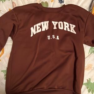 Brown sweater